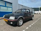 Peugeot 205 CTi 1986, Auto's, Voorwielaandrijving, Zwart, Cabriolet, Leder en Stof