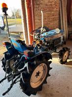 Minitractor iseki met baanpapieren, Ophalen