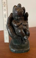 Bronzen beeldje, Ophalen