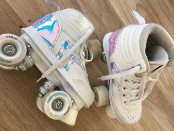 Rolschaatsen oxelo maat 35 met knie- en elleboogbeschermers  beschikbaar voor biedingen