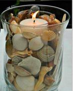 Glazen vaas vol met speciale schelpen, Ophalen