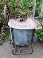 Antieke wasmachine, Ophalen