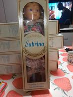 5 porseleinen poppen op staander, Ophalen