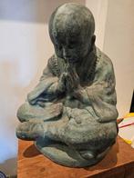 Mooi zwaar buddhabeeld, Ophalen