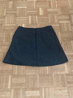 Mini-jupe grise taille 38, Porté