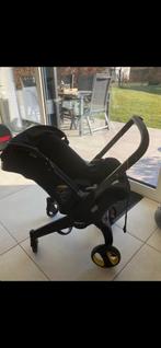Doona+ babyautostoel met geïntegreerde buggy + ISOFIX basis, Kinderen en Baby's, Buggy's, Ophalen, Zo goed als nieuw, Voetenzak