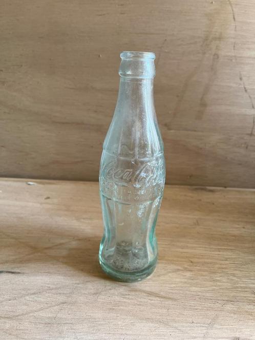Coca Cola flesje volledig in reliëf, Antiek en Kunst, Antiek | Glaswerk en Kristal, Ophalen