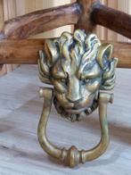 heurtoir à porte en forme de lion., Bronze, Enlèvement