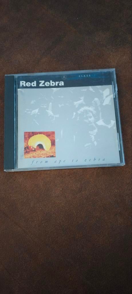 Cd Red Zebra - From ape tot zebra, Ophalen, Gebruikt