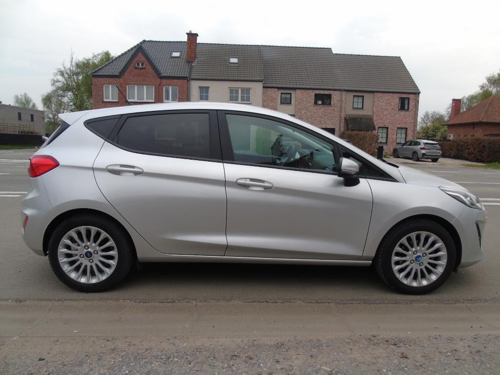 Ford Fiesta 1.1i Titanium*11/2017*AIRCO*1ste Eigen*WEINIG KM, Auto's, Voorwielaandrijving, Stof, USB, Zilver of Grijs