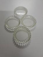 4 kristallen onderleggers, Enlèvement