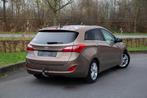 Hyundai i30 Break 1.6i / 111.791km / 2013 / Automaat, Auto's, Euro 5, 4 cilinders, Bruin, Leder en Stof