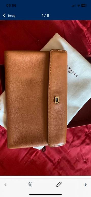 Prachtige splinternieuwe caramelportefeuille Delvaux beschikbaar voor biedingen