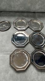 6 verzilverde onderleggers en 1 verzilverde onderlegger BM, Enlèvement