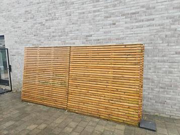 Houten tuinscherm  + houten palen beschikbaar voor biedingen