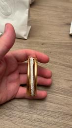 Swarovski armband, Ophalen