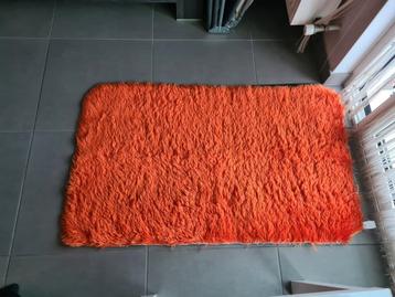 Vintage oranje tapijt beschikbaar voor biedingen