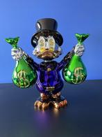 dagobert  duck   met geldzakken, Ophalen