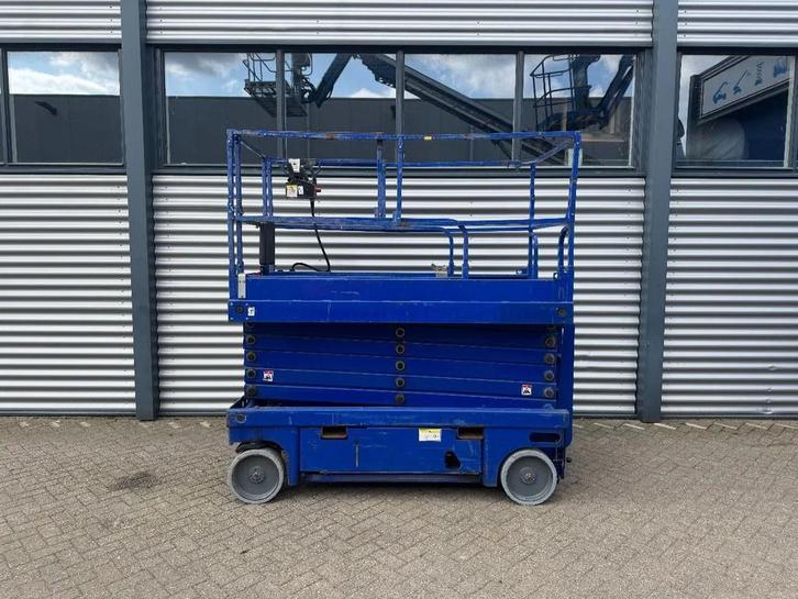 Haulotte Compact 14 Hoogwerker Schaarhoogwerker (bj 2010), Zakelijke goederen, Machines en Bouw | Liften, Steigers en Ladders