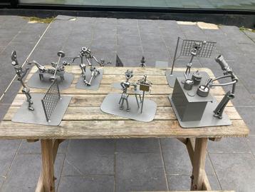 Metalen beeltjes beschikbaar voor biedingen