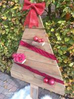 Houten kerstboom, Ophalen