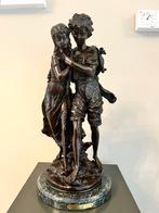bronzen beeld van een jongen en een meisje, Auguste Moreau, Ophalen