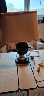 Lamp met paardenkop, Ophalen