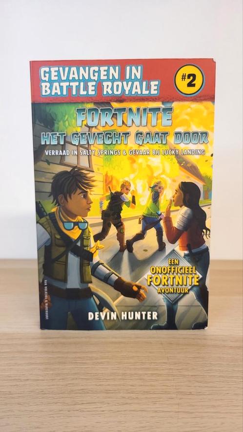 Devin Hunter - Fortnite- Het gevecht gaat door, Boeken, Kinderboeken | Jeugd | 13 jaar en ouder, Zo goed als nieuw, Ophalen of Verzenden