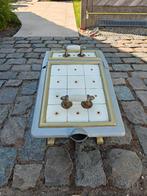 Gietijzeren Kolenkit, Ophalen