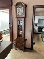 Staande klok werkend, Ophalen