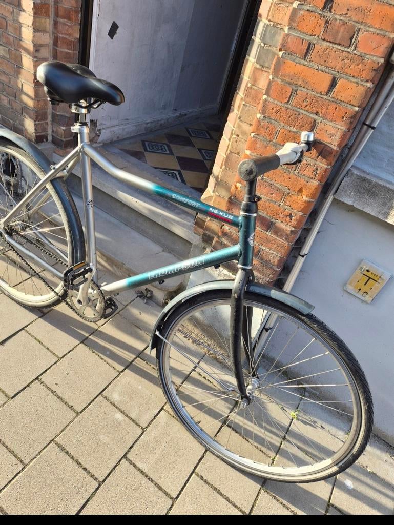 Een herenfiets, Ophalen