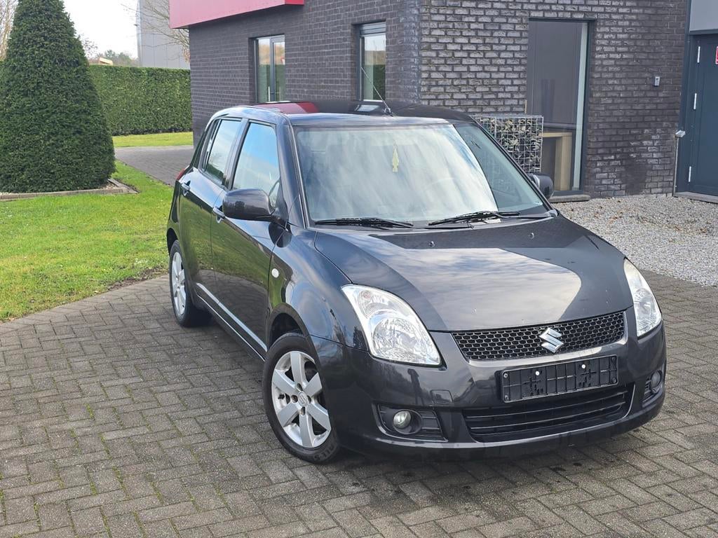 Suzuki Swift 1.4 benzine 165.000km/airco/garantie en keuring, Auto's, Suzuki, Radio, Swift, Leder, Bedrijf