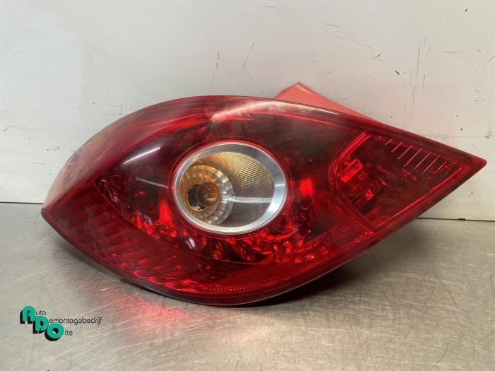 Achterlicht links van een Opel Corsa (Corsa D 07-), Auto-onderdelen, Verlichting, Opel, Gebruikt, 3 maanden garantie, Ophalen of Verzenden