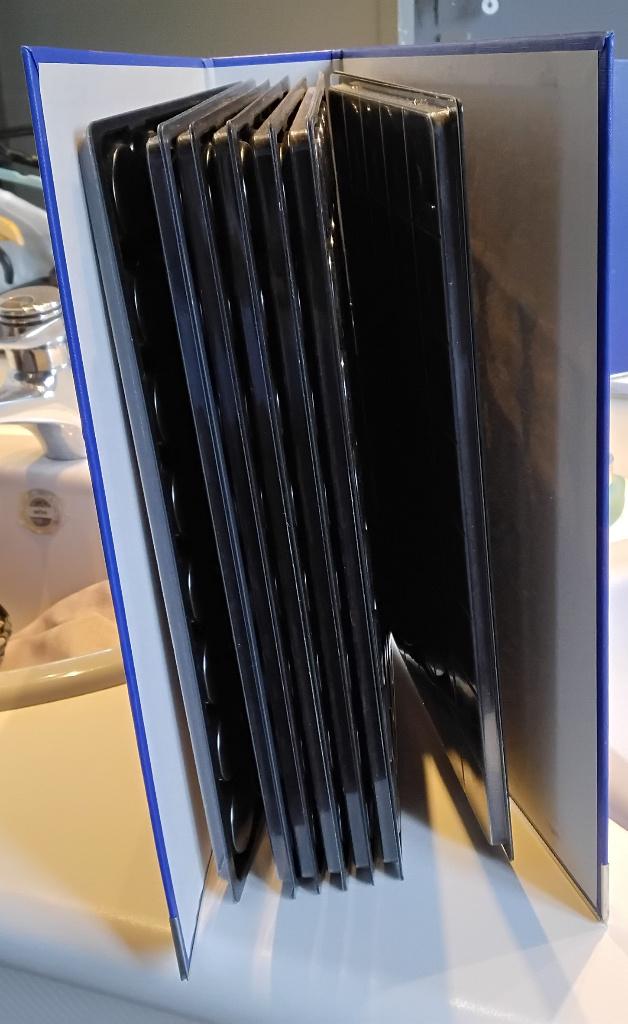 Lot d'un classeur pour capsules de champagne ou monnaie, Verzamelen, Complete verzamelingen en Collecties, Ophalen of Verzenden