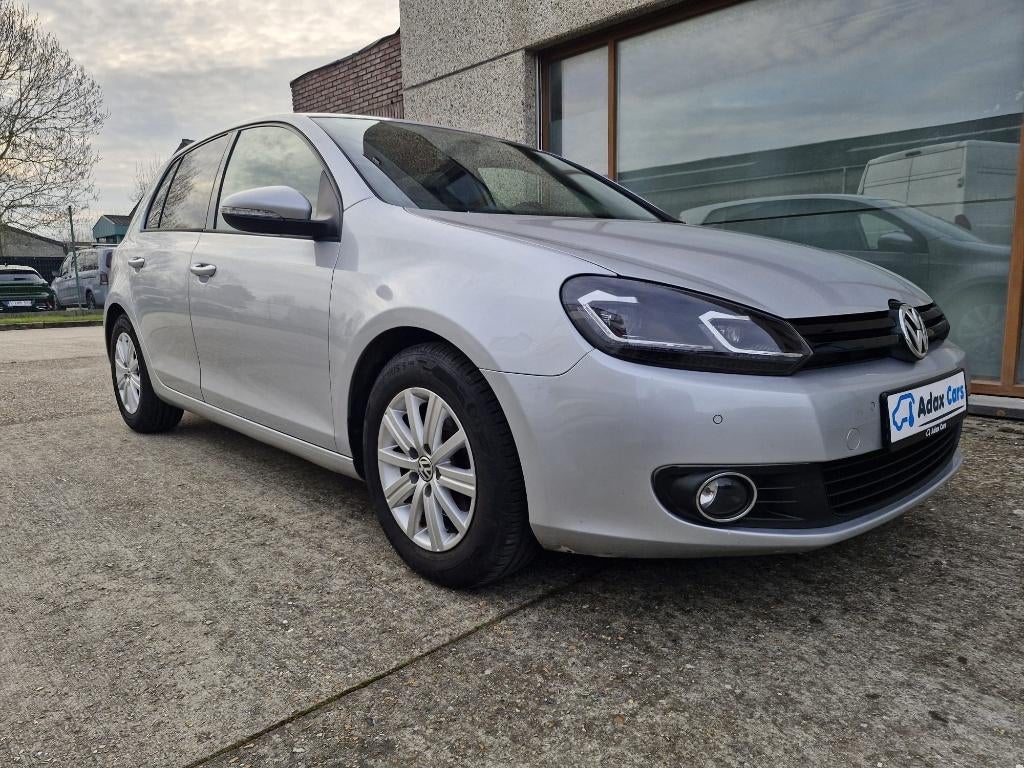 Volkswagen Golf 5 1.6 TDI 2013 1 jaar garantie, Voorwielaandrijving, Euro 5, Stof, Zwart