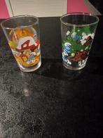 2 verschillende amora schtroumf mosterdglaasjes, Verzamelen, Glas en Drinkglazen, Ophalen of Verzenden