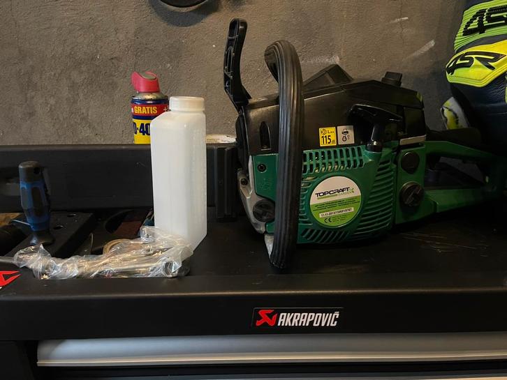 kettingzaag., Tuin en Terras, Bladblazers, Zo goed als nieuw, Benzine, Ophalen