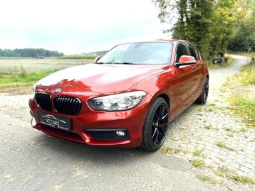 BMW 116I / SUNSET ORANGE / NAVI / CRUISE CONTROL / GARANTIE disponible aux enchères