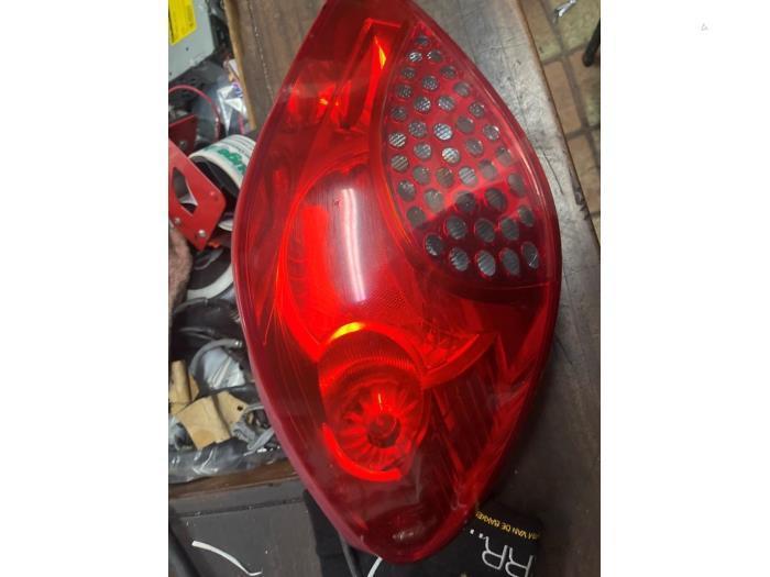 Achterlicht links van een Peugeot 207, Auto-onderdelen, Verlichting, Peugeot, Gebruikt, 3 maanden garantie, Ophalen of Verzenden