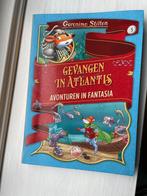 boek geronimo stilton 'gevangen in Atlantis', Boeken, Ophalen, Gelezen, Fictie algemeen