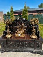 Bronzen klok met 2 kandelaars, Ophalen