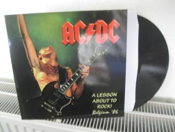 AC/DC - A LESSON ABOUT TO ROCK - BELGIUM '86 beschikbaar voor biedingen