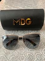 Madonna D&G zonnebril, Ophalen
