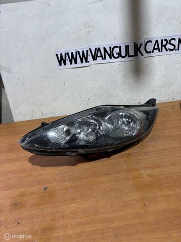 Koplamp links Ford Fiesta VI ('08-'17) beschikbaar voor biedingen