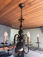 Koperen luchter, Ophalen