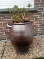 Grote stenen bloempot, Ophalen