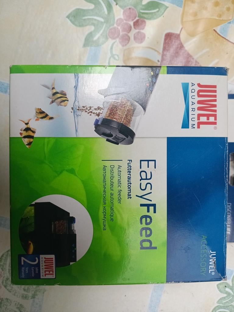 Système d'alimentation automatique pour aquarium, Enlèvement