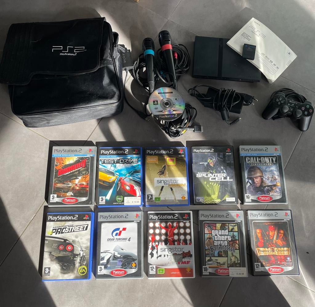 Playstation 2 PS2 met 11 spellen, microfoons en zak, Games en Spelcomputers, Spelcomputers | Sony PlayStation 3, Ophalen of Verzenden