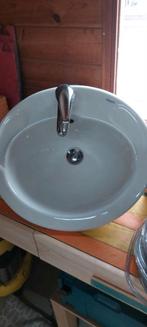 Lavabotje met kraan, Ophalen