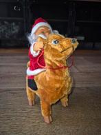 Hert met kerstman. Wandelt en gezicht kerstman brandt rood, Diversen, Ophalen